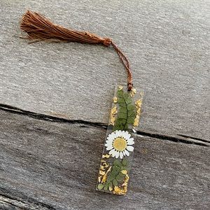 Handmade resin bookmark with dried flowers and gold embellishments